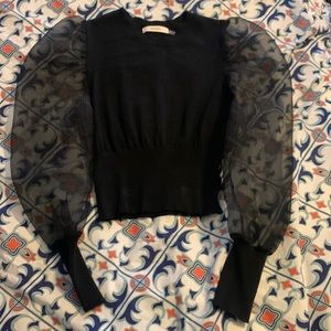 Black sweater with sheer sleeve